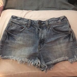 High waisted light wash denim shorts.